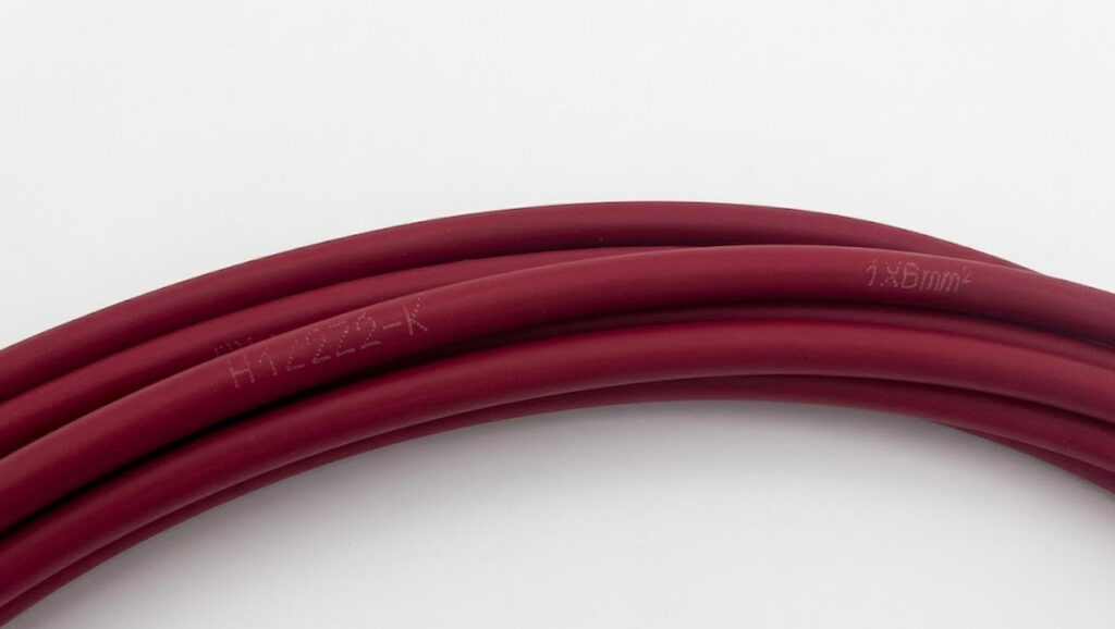 Red solar cable with printed model and conductor size markings